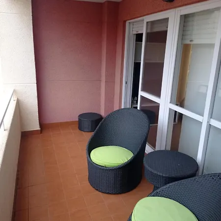 Апартаменты Apartamento Con Piscina Санхенхо