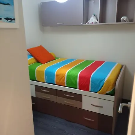 Апартаменты Apartamento Con Piscina Санхенхо